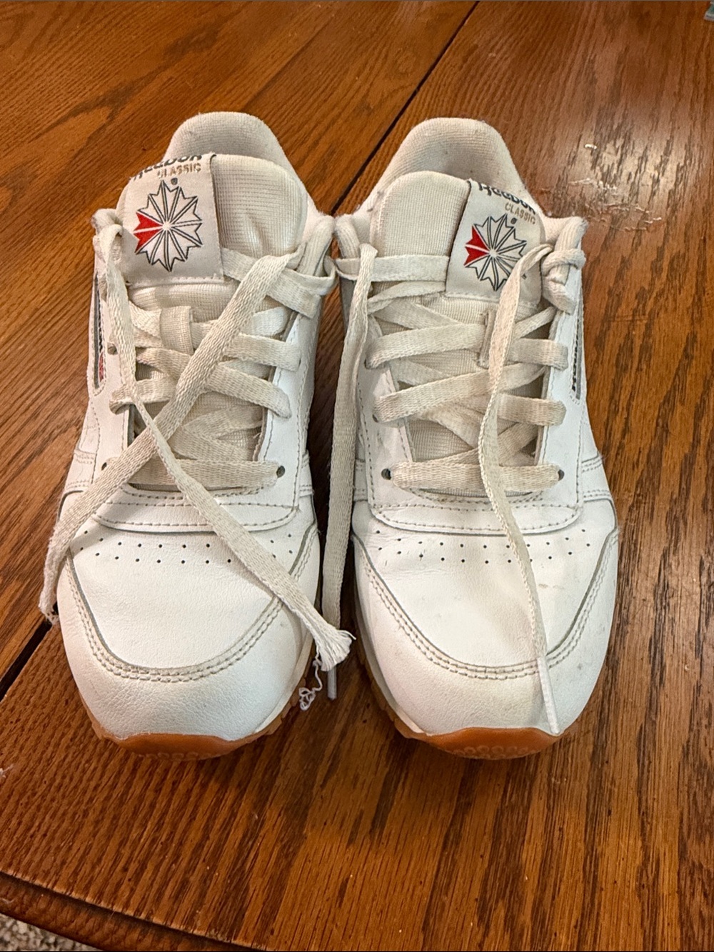 Reebok Kids White Sneakers with Red Star Accent